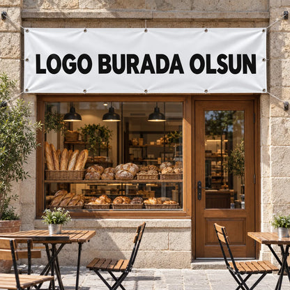 Branda afiş: dükkân vitrini üstüne kuşgözlerinden gerilmiş vinil branda, logonuz basılır