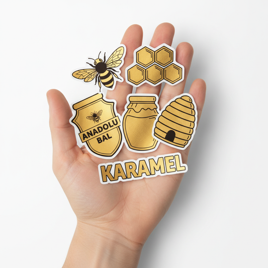 Elde tam kesim altın metalize sticker çeşitleri — arı, petek ve yazı formunda kesim