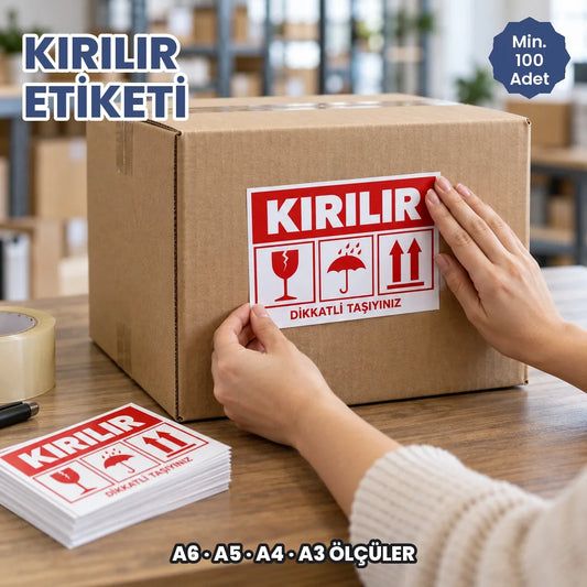 Kargo kırılır etiketi: koliye yapıştırılan kırmızı beyaz kırılır ikaz etiketi ve baskılı etiket destesi