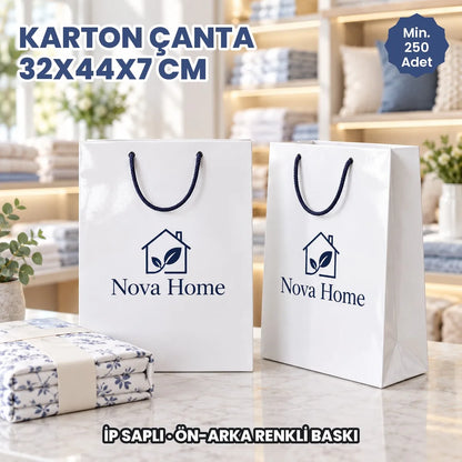 Karton çanta 32x44x7 cm örneği: ön ve arka yüzü baskılı, ip saplı parlak selofanlı kâğıt çanta