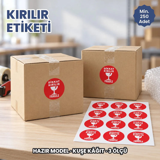 Kırılır etiketi hazır model: kargo kolilerinde ve tabakada kırmızı yuvarlak Dikkat Kırılır Fragile etiketi