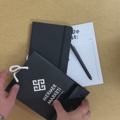 Yönetici Promosyon Seti: termo deri defter, tutkallı bloknot, karton çanta ve kalem videosu